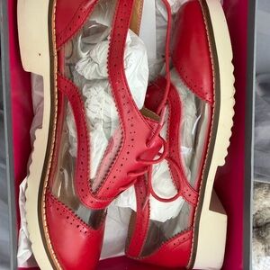 Kelsi Dagger Red and clear Women's sneakers